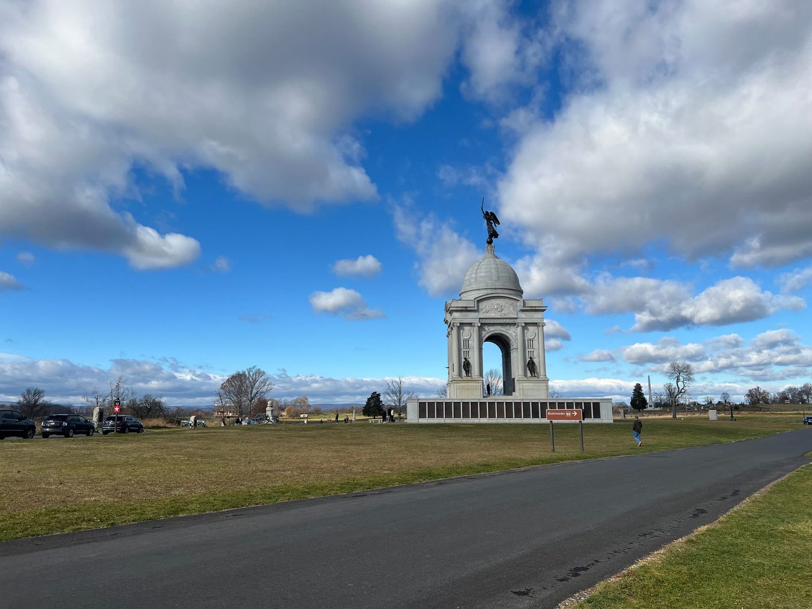 The Pennsylvania Memorial in Gettysburg under a vibrant blue sky.