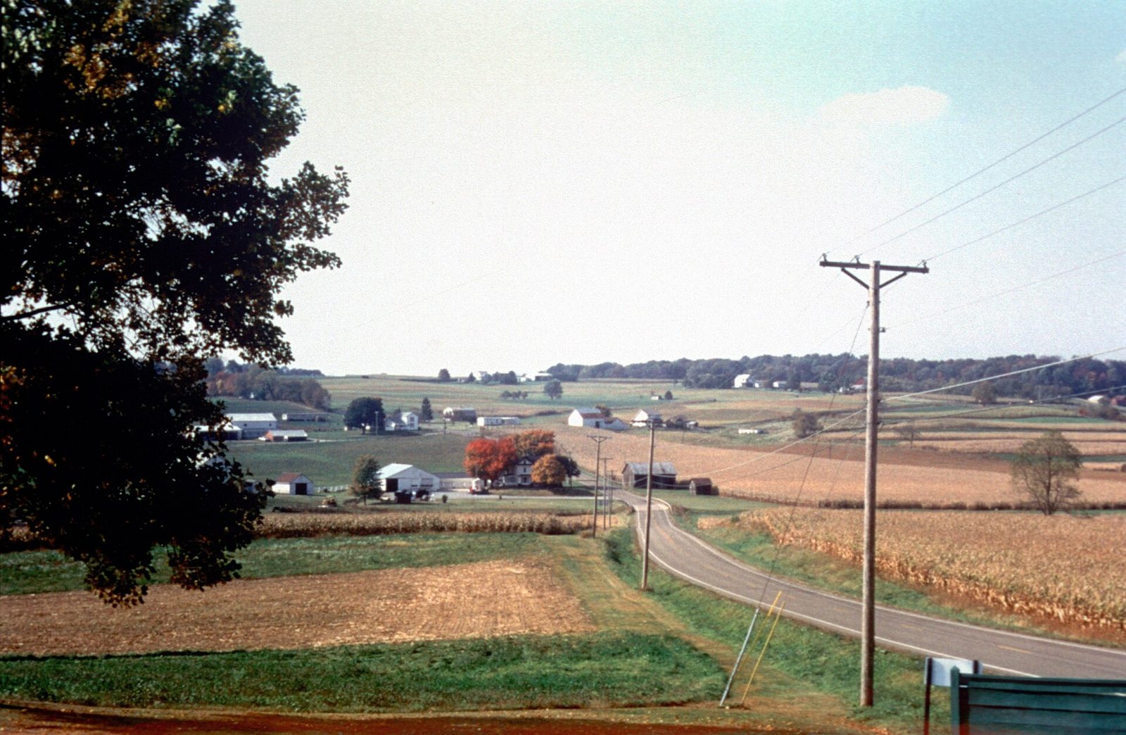 Rolling farmland and a red bank barn in Lancaster County, Pennsylvania